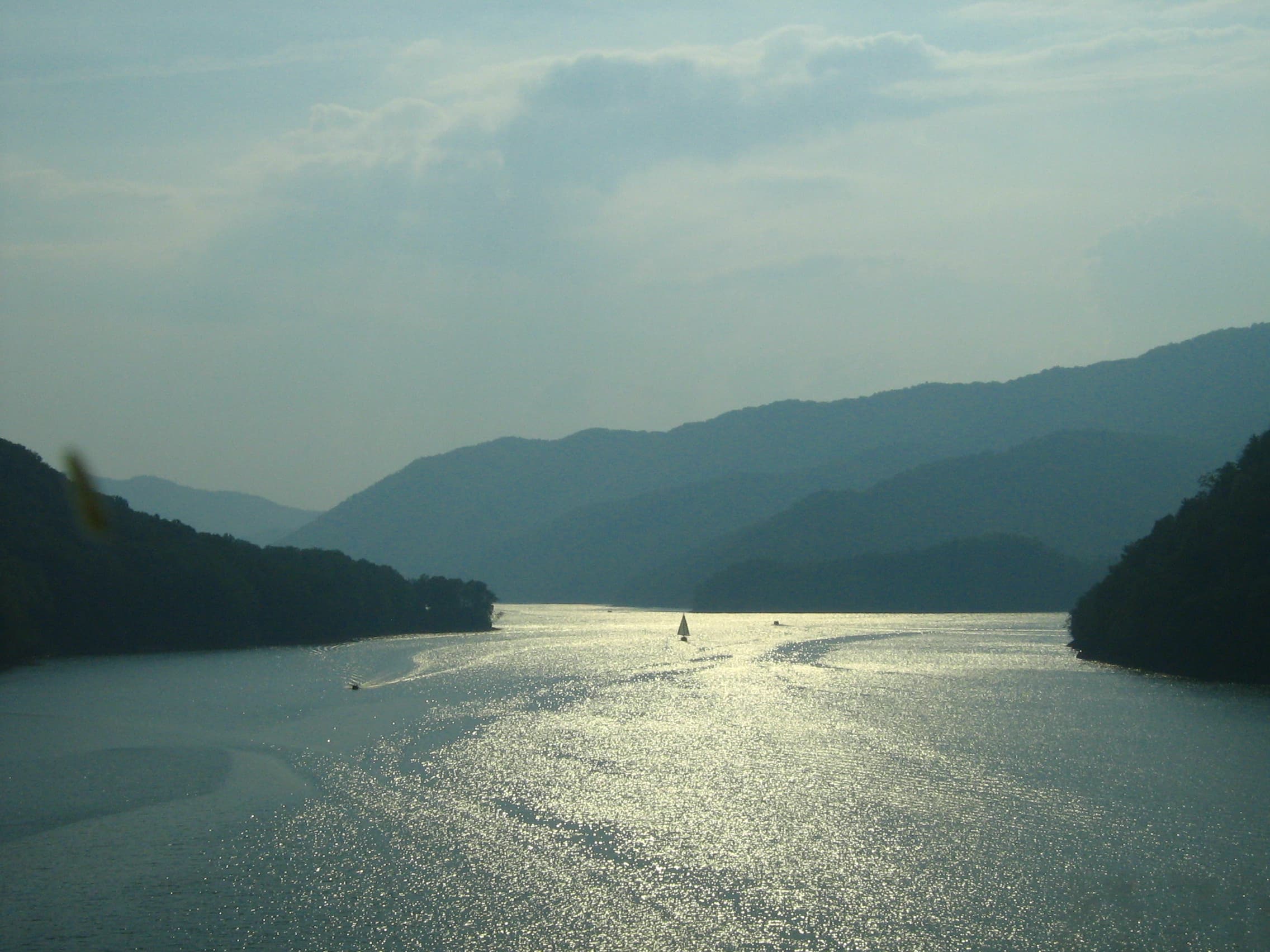 Watauga Lake surrounded by forested mountains in Carter County, Tennessee