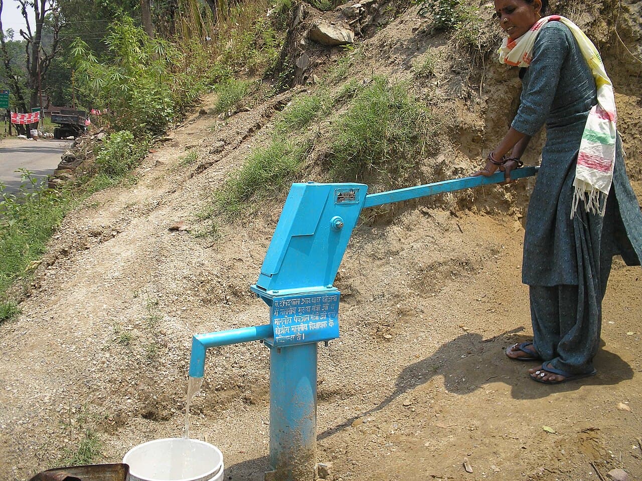 A rural water well in a countryside setting